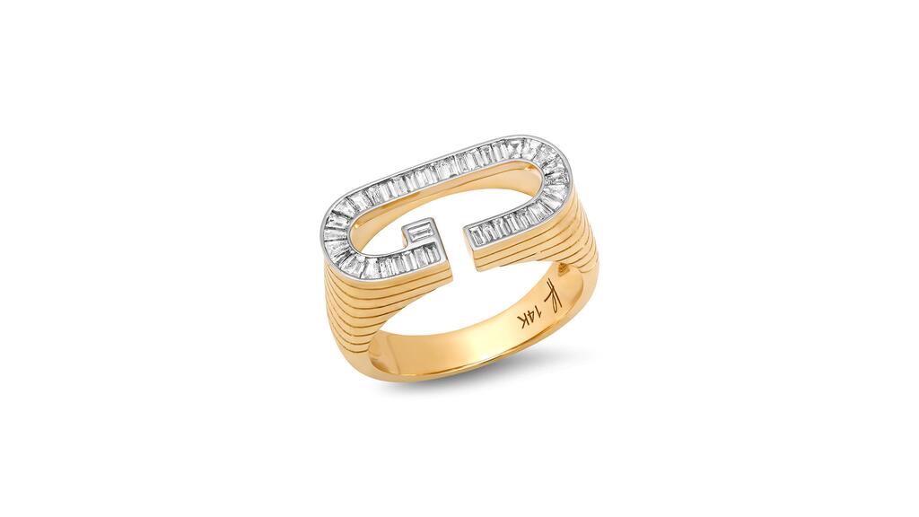The diamond-set “Grandsize” initial ring from Helena Rose’s “Character” collection, with 40 baguette-shaped diamonds totaling 0.66 carats set in 14-karat yellow gold ($6,300) Grandsize Diamond Encrusted Initial Ring